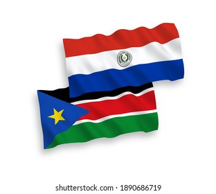 National vector fabric wave flags of Paraguay and Republic of South Sudan isolated on white background. 1 to 2 proportion.