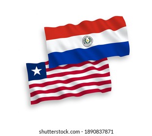 National vector fabric wave flags of Paraguay and Liberia isolated on white background. 1 to 2 proportion.