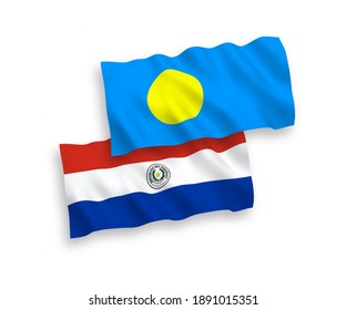 Banderas de olas de tela vectorial nacional del Paraguay y Palau aisladas en fondo blanco. de 1 a 2.
