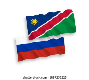 National vector fabric wave flags of Republic of Namibia and Russia isolated on white background. 1 to 2 proportion.