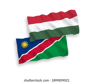 Banderas de olas de tela vectorial nacional de la República de Namibia y Hungría aisladas en fondo blanco. de 1 a 2.