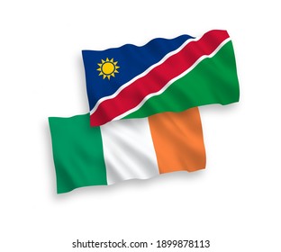 National vector fabric wave flags of Ireland and Republic of Namibia isolated on white background. 1 to 2 proportion.