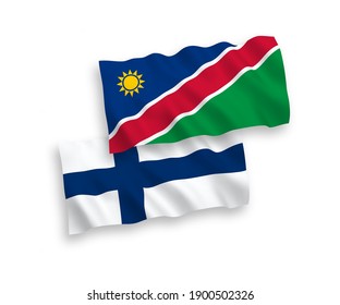 National vector fabric wave flags of Finland and Republic of Namibia isolated on white background. 1 to 2 proportion.