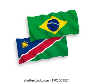 National vector fabric wave flags of Brazil and Republic of Namibia isolated on white background. 1 to 2 proportion.