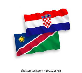 Banderas de olas de tela vectorial nacional de la República de Namibia y Croacia aisladas en fondo blanco. de 1 a 2.