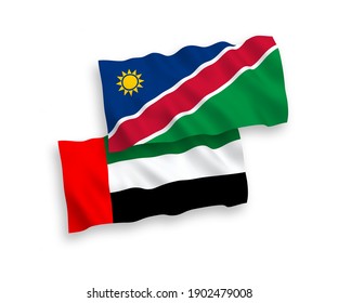 National vector fabric wave flags of Republic of Namibia and United Arab Emirates isolated on white background. 1 to 2 proportion.