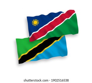 National vector fabric wave flags of Republic of Namibia and Tanzania isolated on white background. 1 to 2 proportion.