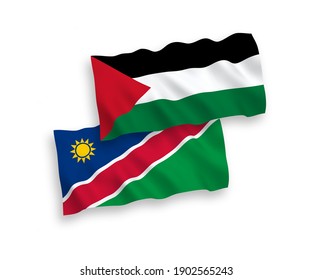 National vector fabric wave flags of Republic of Namibia and Palestine isolated on white background. 1 to 2 proportion.