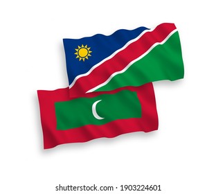 Banderas de olas de tela vectorial nacional de la República de Namibia y Maldivas aisladas en fondo blanco. de 1 a 2.