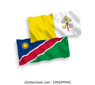 Banderas de olas de tela vectorial nacional de la República de Namibia y el Vaticano aisladas en fondo blanco. de 1 a 2.