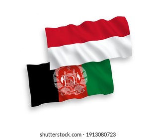 National vector fabric wave flags of Indonesia and Islamic Republic of Afghanistan isolated on white background. 1 to 2 proportion.