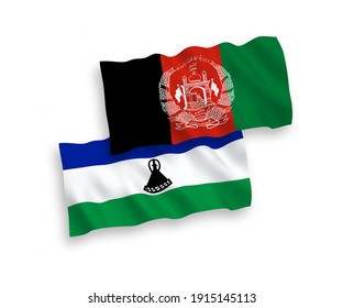 National vector fabric wave flags of Islamic Republic of Afghanistan and Lesotho isolated on white background. 1 to 2 proportion.