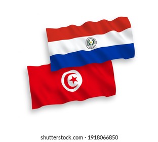 National vector fabric wave flags of Republic of Tunisia and Paraguay isolated on white background. 1 to 2 proportion.