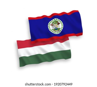 National vector fabric wave flags of Belize and Hungary isolated on white background. 1 to 2 proportion.