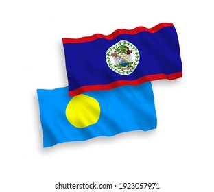 Nationale Vektor-Wellen-Flaggen von Belize und Palau einzeln auf weißem Hintergrund. 1 bis 2 %.