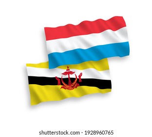 Banderas de olas de tela vectorial nacional de 000 y Luxemburgo aisladas en fondo blanco. de 1 a 2.