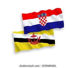 National vector fabric wave flags of Brunei and Croatia isolated on white background. 1 to 2 proportion.