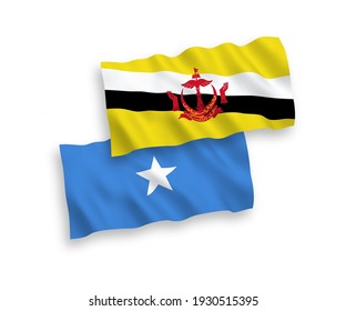 National vector fabric wave flags of Brunei and Somalia isolated on white background. 1 to 2 proportion.