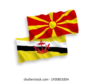 Banderas de la ola de tela vectorial nacional en Brunei y el norte de Macedonia aisladas en fondo blanco. de 1 a 2.