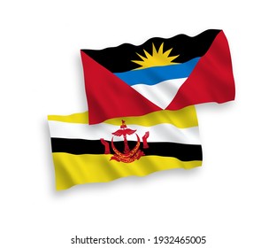 National vector fabric wave flags of Brunei and Antigua and Barbuda isolated on white background. 1 to 2 proportion.