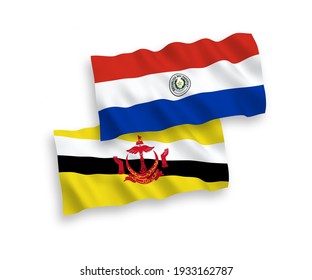 Banderas de ondulación de tela vectorial nacional de Brunei y Paraguay aisladas en fondo blanco. de 1 a 2.