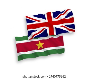 National vector fabric wave flags of Great Britain and Republic of Suriname isolated on white background. 1 to 2 proportion.