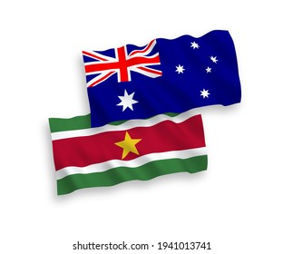 National vector fabric wave flags of Australia and Republic of Suriname isolated on white background. 1 to 2 proportion.