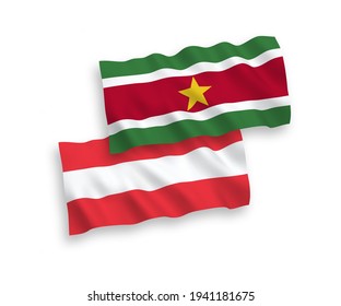 National vector fabric wave flags of Austria and Republic of Suriname isolated on white background. 1 to 2 proportion.