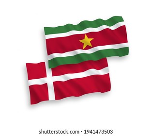 National vector fabric wave flags of Denmark and Republic of Suriname isolated on white background. 1 to 2 proportion.
