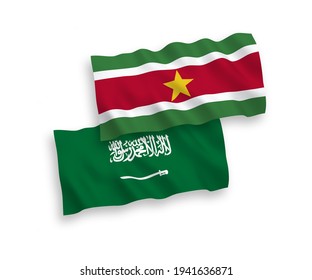 National vector fabric wave flags of Saudi Arabia and Republic of Suriname isolated on white background. 1 to 2 proportion.