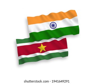 National vector fabric wave flags of India and Republic of Suriname isolated on white background. 1 to 2 proportion.