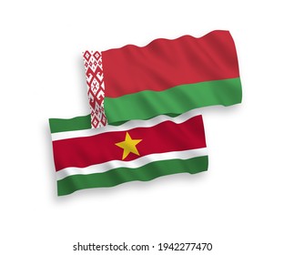 National vector fabric wave flags of Republic of Suriname and Belarus isolated on white background. 1 to 2 proportion.