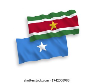 National vector fabric wave flags of Republic of Suriname and Somalia isolated on white background. 1 to 2 proportion.