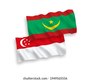 National vector fabric wave flags of Islamic Republic of Mauritania and Singapore isolated on white background. 1 to 2 proportion.