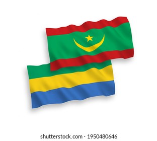 National vector fabric wave flags of Islamic Republic of Mauritania and Gabon isolated on white background. 1 to 2 proportion.