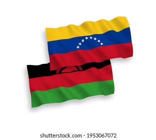 National vector fabric wave flags of Venezuela and Malawi isolated on white background. 1 to 2 proportion.