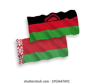 National vector fabric wave flags of Malawi and Belarus isolated on white background. 1 to 2 proportion.