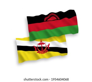 National vector fabric wave flags of Malawi and Brunei isolated on white background. 1 to 2 proportion.