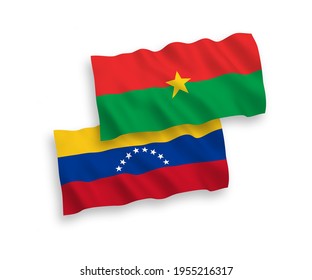 National vector fabric wave flags of Venezuela and Burkina Faso isolated on white background. 1 to 2 proportion.