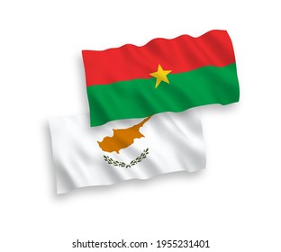 National vector fabric wave flags of Cyprus and Burkina Faso isolated on white background. 1 to 2 proportion.