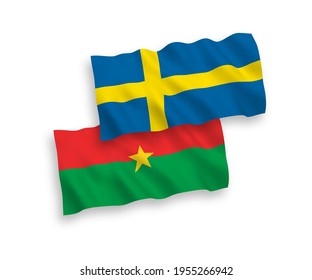 National vector fabric wave flags of Sweden and Burkina Faso isolated on white background. 1 to 2 proportion.