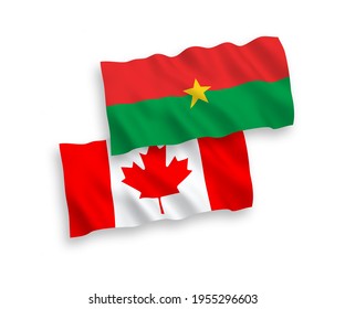 National vector fabric wave flags of Canada and Burkina Faso isolated on white background. 1 to 2 proportion.