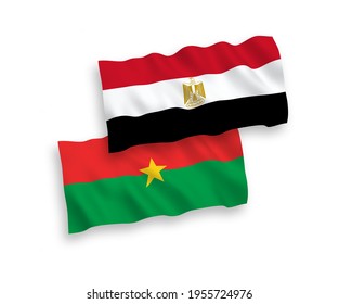 National vector fabric wave flags of Burkina Faso and Egypt isolated on white background. 1 to 2 proportion.