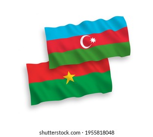 National vector fabric wave flags of Burkina Faso and Azerbaijan isolated on white background. 1 to 2 proportion.