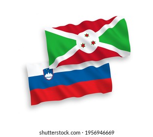 National vector fabric wave flags of Slovenia and Burundi isolated on white background. 1 to 2 proportion.