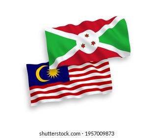 National vector fabric wave flags of Burundi and Malaysia isolated on white background. 1 to 2 proportion.