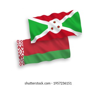 National vector fabric wave flags of Burundi and Belarus isolated on white background. 1 to 2 proportion.