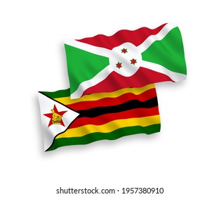 National vector fabric wave flags of Burundi and Zimbabwe isolated on white background. 1 to 2 proportion.