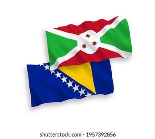 National vector fabric wave flags of Burundi and Bosnia and Herzegovina isolated on white background. 1 to 2 proportion.