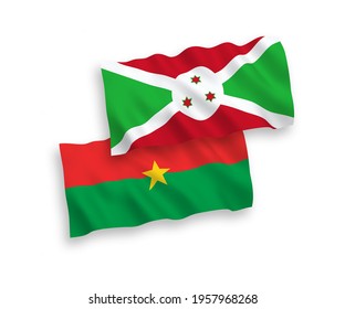 National vector fabric wave flags of Burundi and Burkina Faso isolated on white background. 1 to 2 proportion.